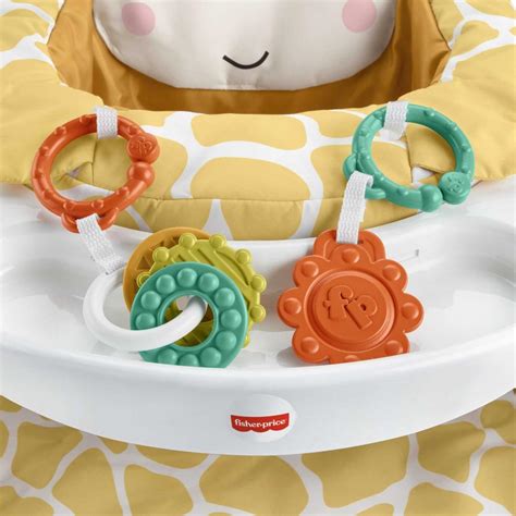 Fisher-Price etetőszék kiegészítőkkel, például csörgőkkel